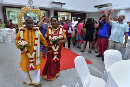 Velappan Vellayan married his childhood friend Savithiri Kaliappan at Sree Narayana Mission Nursing Home where he has lived for the past 11 years.ST PHOTO: NG SOR LUAN