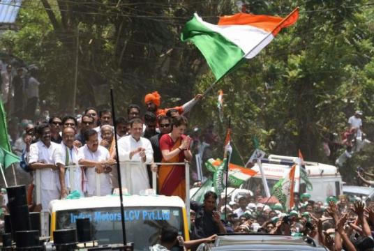 Mr Rahul Gandhi, president of India's main opposition Congress party, and his sister Priyanka Gandhi Vadra greet their supporters after Mr Gandhi filed his nomination papers for the general election in Wayanad, India, on April 4, 2019.PHOTO: AFP