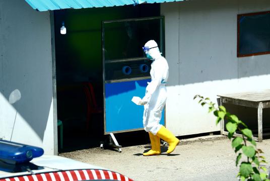 A volunteer working at a Covid-19 treatment center 
