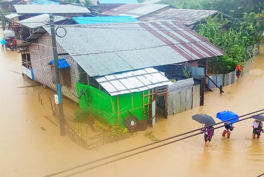 Flood water covered a resident area in Mogaung