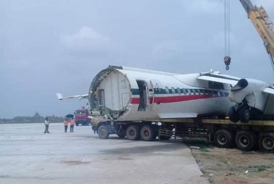 A truck carrying wreckage of Biman Bangladesh plane