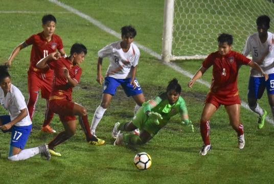 Indian goalkeeper tried to save an attack by Myanmar team (Photo-Nyi Nyi Soe Nyunt)