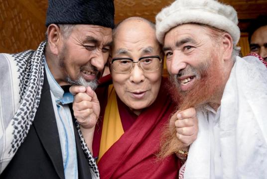 His Holiness the Dalai Lama playfully posing with Muslim leaders from Turtuk who came to meet him on the final day of his teachings in Disket, Nubra Valley, J&K, India on July 13, 2017. (Photo by Tenzin Choejor)