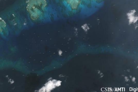 This satellite image shows large Chinese flotilla spotted near Pagasa Island on Dec. 20, 2018. (From CSIS Asia Maritime Transparency Initiative)