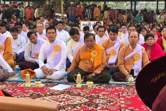 Former Mandalay Region Chief Minister Dr Zaw Myint Maung and Maung Weik seen at the seventh umbrella-hoisting ceremony of the Maha Wizayanthi Pagoda in Amarapura Township on February 19, 2019. 