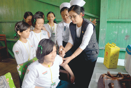 The measles and rubella immunization program at a school in 2015. (Photo-Kyi Naing)