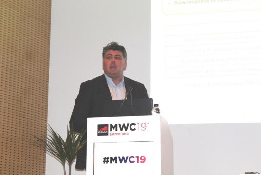 Elias Aravantinos, a senior analyst at IHS Markit, at a press conference during the MWC19 in Barcelona, Spain (Photo- Khine Kyaw, Myanmar Eleven)