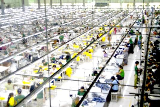 Photo shows the worksite of a garment factory in Myanmar. 