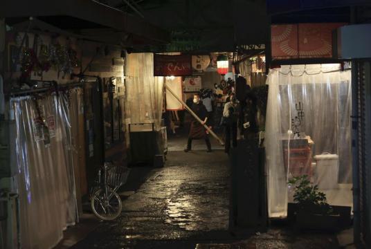 An entertainment district in Osaka is seen on Nov. 27. Some dining establishments closed early in response to requests to shorten business hours.