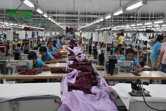 The workers are doing the sewing at a garment factory. (Photo-Zeyar Nyein)