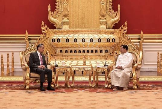 China’s Foreign Minister Wang Yi (left) speaking with Myanmar President Min Aung Hlaing during a meeting at the presidential house in Naypyitaw, Myanmar, on April 25. PHOTO: EPA