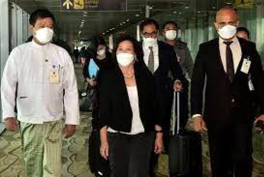 UN Special Envoy on Myanmar Noeleen Heyzer (centre) walking with high-level officials following her arrival at Yangon's airport, on Aug 16, 2022. PHOTO: AFP