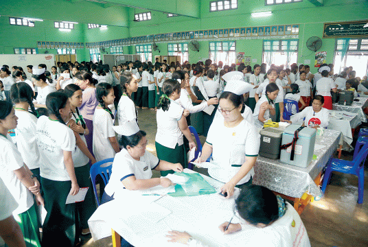 A school-based JE vaccination program in 2017. (Photo-Kyi Naing) 
