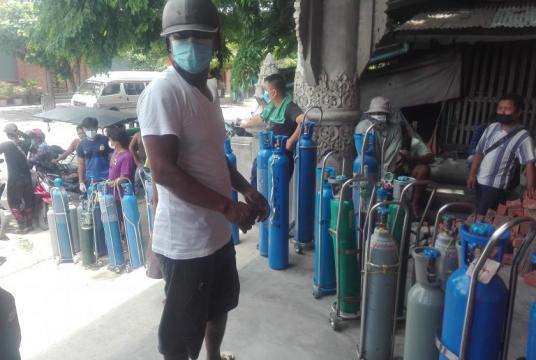 Oxygen cylinders being filled in Kalay where state-at-home order is imposed as Covid-19 cases surge