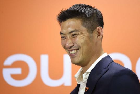 Future Forward Party leader Thanathorn Juangroongruangkit smiles during a press conference in Bangkok on March 25, 2019.PHOTO: AFP