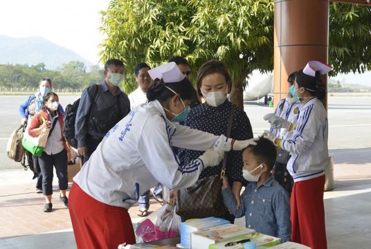 Medical  tests being carried out on passengers arriving at Lashio Airport. Photo-Tun Nay Hlaing (Naungpein)