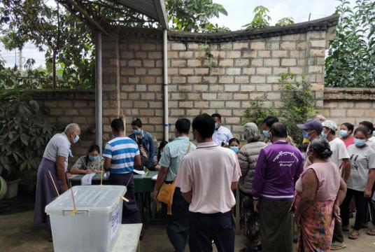 Caption: Voters casting their votes at the house of ward (3) administrator in  Pangsaing (Kyukote) in Muse township