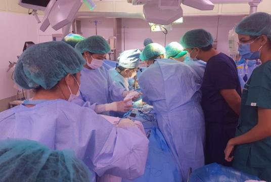 Caption- Medical team at the 500-Bed Specialty Hospital (Yangon) seen conducting Liver transplant operation (Photo-Ministry of Health)