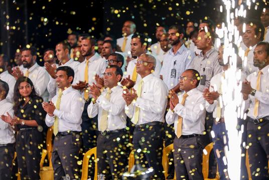 In this file photo taken on February 1, 2019, Maldives' former president Mohamed Nasheed (3L), with current President Ibrahim Mohamed Solih (4R), takes part in an election rally after securing his party's ticket from the Maldives Democratic Party (MDP) to stand in upcoming parliamentary polls in Male. The Maldives on April 6, 2019 held its first parliamentary election since former strongman leader Abdulla Yameen was forced to stand down, with his arch-rival expected to make a big comeback in the vote. (Ahme