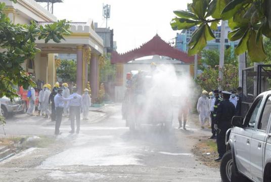 Disinfectants being sprayed at a monastery in Mandalay city on April 25  