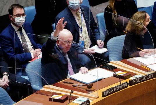 Russia's Ambassador to the United Nations Vassily Nebenzia votes during a United Nations Security Council meeting on Feb 25, 2022. PHOTO: REUTERS