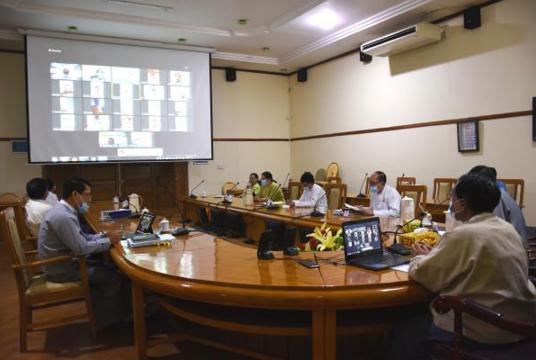 The coordination meeting in progress through a video conferencing (Photo-Ministry of Commerce) 