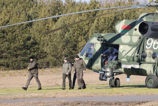 Members of the Ukrainian delegation disembarking from a helicopter as they arrive for talks with Russian representatives in the Gomel region, Belarus, on Feb 28, 2022. PHOTO: REUTERS