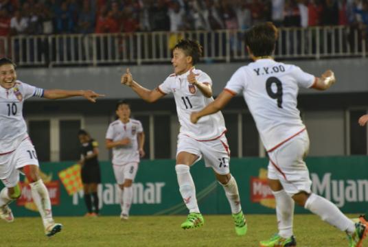 Myanmar national women’s players celebrate after scoring a goal. (MFF)