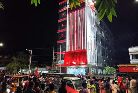 upporters celebrate the election victory of NLD in front of the NLD headquarters in Yangon on the night of November 9