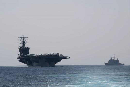 Aircraft carrier USS Nimitz (left) transiting the Strait of Hormuz, on Sept 18, 2020. PHOTO: AFP
