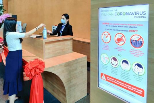 Hand sanitisers have been made available at CapitaLand's Singapore properties, including CapitaGreen (pictured).PHOTO: CAPITALAND GROUP