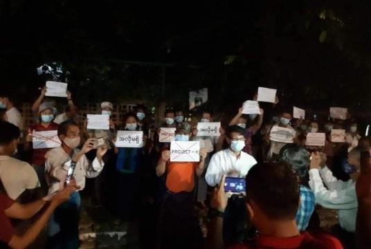 Project K faces a protest when they arrive back in Yangon