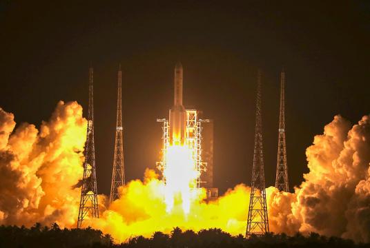 A Long March 5 rocket carrying China's heaviest satellite yet lifts off on Friday night in Wenchang, Hainan province. XU JINGXING/CHINA DAILY