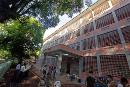 Caption: Four floor building of Sagaing Education Degree College which is changed into a COVID-19 quarantine center 