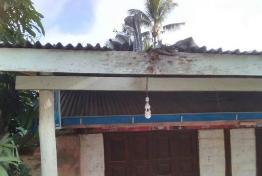 Some damages are seen on the roof of the house due to the occurrance of TNLA's attack in Hsenwi.