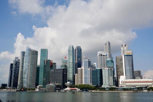  Overall, the Singapore economy grew by 3.3 per cent in the whole of 2018, down from 2017's 3.6 per cent.PHOTO: ST FILE