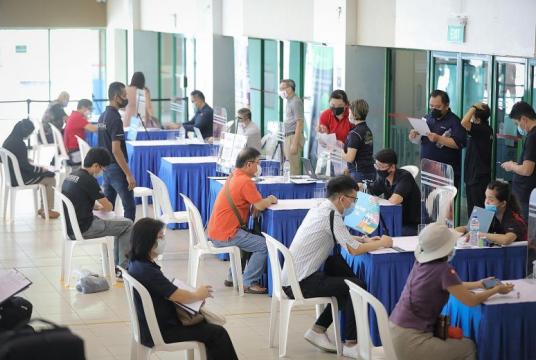 People at a job fair held by the National Trades Union Congress' Employment and Employability Institute at Chong Pang Community Club last month.ST PHOTO: ONG WEE JIN