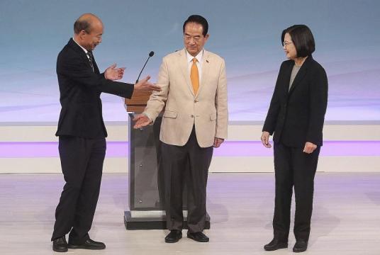 From left: Mr Han Kuo-yu from the Kuomintang, People First Party chairman James Soong and President Tsai Ing-wen of the Democratic Progressive Party before the start of their televised debate in Taipei yesterday. Taiwan will hold its general elections on Jan 11.PHOTO: ASSOCIATED PRESS
