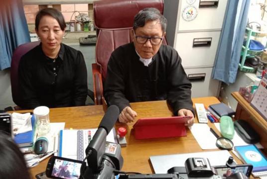 Lawyer Min Min Soe (left) and lawyer Khin Maung Zaw (right) taking media questions. 
