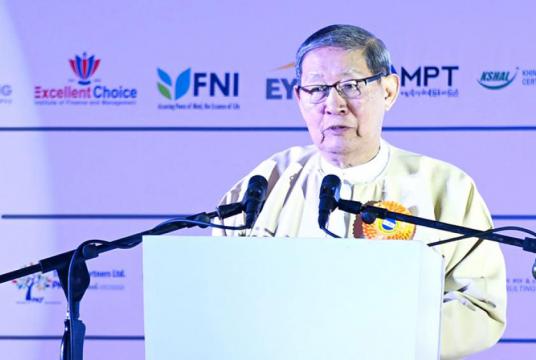 Soe Win, Union Minister for Planning and Finance gives a speech at Myanmar Commerce Fair-2018 in Yangon.