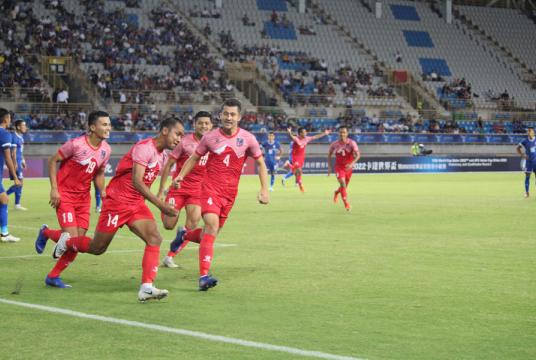 Anjan Bista (No 14) celebrates after scoring a goal against Taiwan during their joint World Cup and Asian Cup qualifying match in Taipei on Tuesday. Photo Courtesy: NSJF