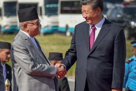 Prime Minister KP Sharma Oli shakes hands with Chinese President Xi Jinping as the latter departs from Kathmandu after his two-day state visit. Angad Dhakal/TKP