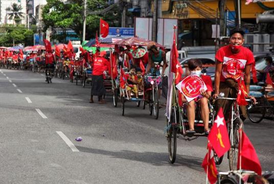 NLD supporters on trishaws in Ygn’s Stay-at-home areas