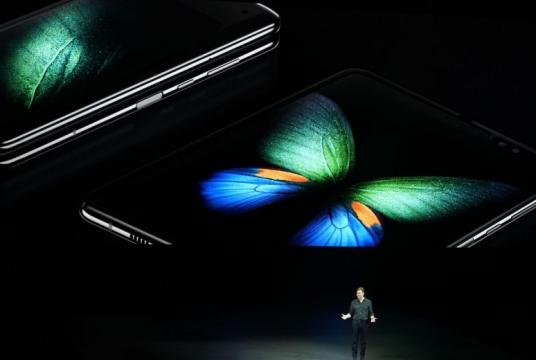 Mr Justin Denison, Samsung's SVP of Product Marketing, unveiling the Galaxy Fold foldable smartphone during the media event in San Francisco.ST PHOTO: TREVOR TAN