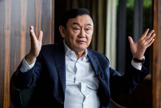 Former Thailand prime minister Thaksin Shinawatra said that he was not sure the new government would be stable and sustainable for a full term.PHOTO: AFP