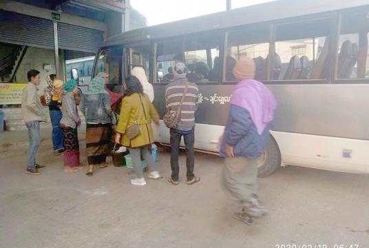Myanmar workers seen on February 23 at Lashio bus terminal preparing to go to Laukkai and Chinshwehaw 