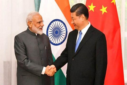 Prime Minister Narendra Modi with Chinese President Xi Jinping. (File Photo: IANS) 