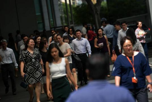 Just under half of the Singaporeans surveyed were satisfied with their current job, said the report by Qualtrics on Jan 16, 2019.PHOTO: ST FILE