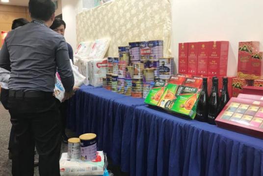 John Foo Chi Yang had bought more than $19,000 worth of products online using fraudulently obtained credit card details, including formulated milk powder, diapers and tonic wine.PHOTO: LIANHE WANBAO