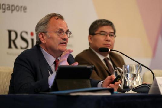 Mr Keith Rockwell (left), WTO's director for information and external relations, and Dr Henry Gao, Associate Professor, School of Law, Singapore Management University at the workshop on June 11, 2019.ST PHOTO: GIN TAY